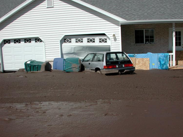 
Debris flow damage in Santaquin, along the Wasatch front, central Utah (Utah Geological Survey).