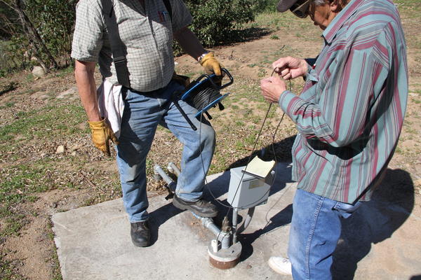 Measuring well static level at Thompson Creek, March 3, 2012